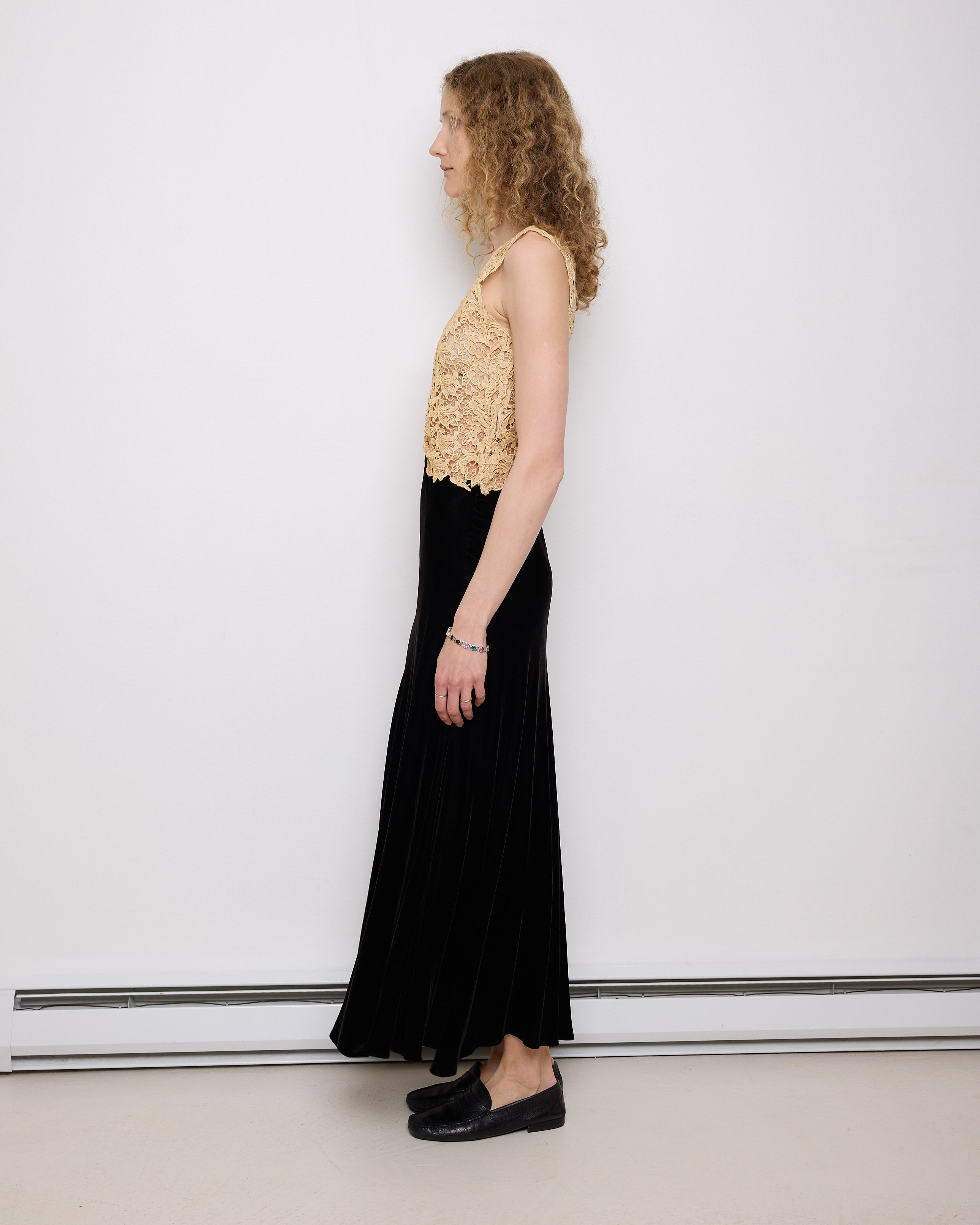 Vintage Lace and Velvet Dress, 56.5-inch length, 15.5-inch bust laid flat. Fits size S–M. Model is 5'11", very good vintage condition