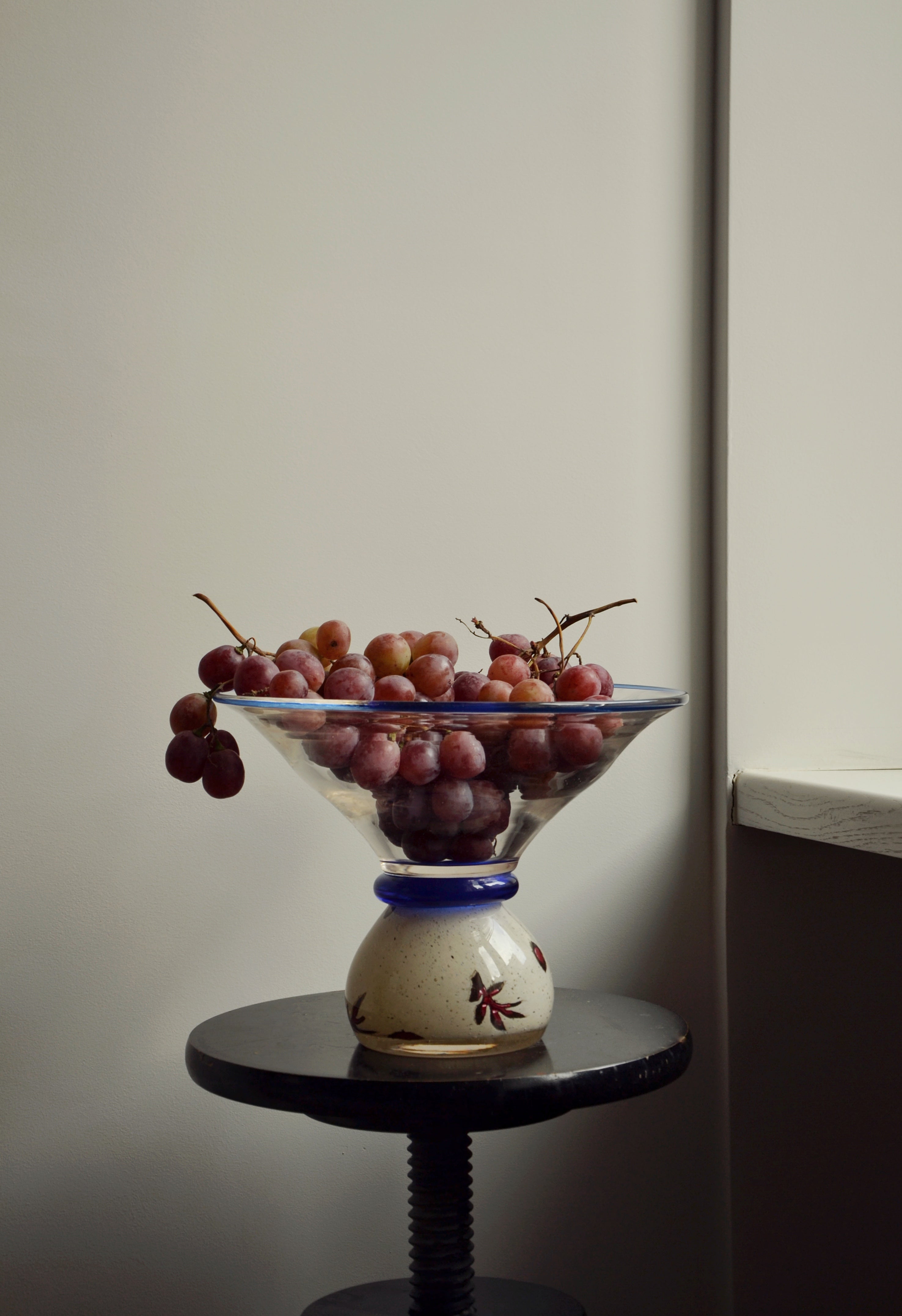 Discover the Modern Vintage Guta Glass Blue + Milk Edition – a handcrafted consignment piece, blending traditional glass artistry with a contemporary aesthetic.