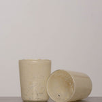 Discover the YAKUSH Blur Glass – a 4.7" tall, 3.5" wide handcrafted drinking glass made from recycled eco-friendly materials, perfect for water or cocktails.