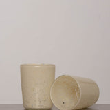 Discover the YAKUSH Blur Glass – a 4.7" tall, 3.5" wide handcrafted drinking glass made from recycled eco-friendly materials, perfect for water or cocktails.