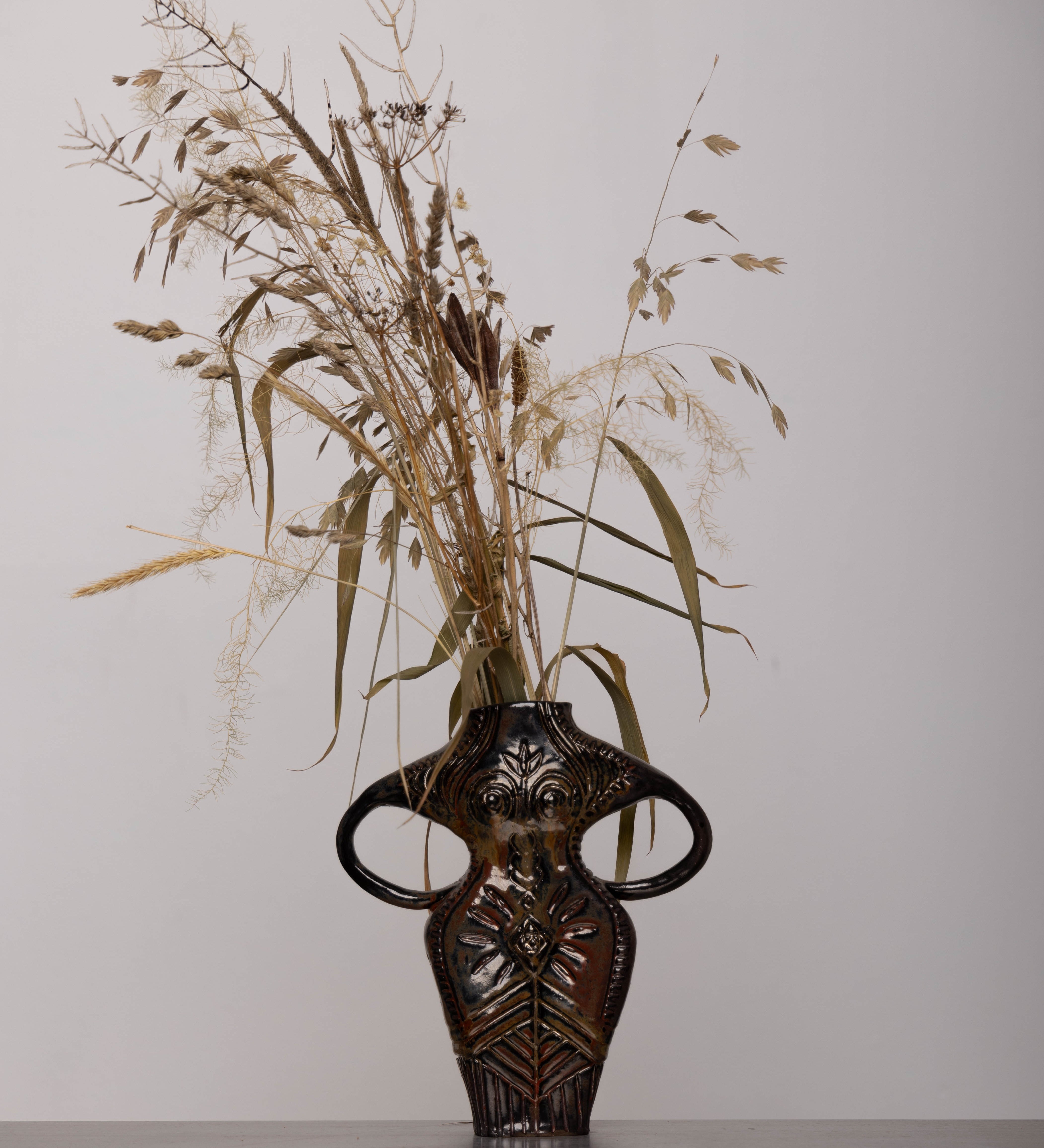 Discover the KKS Madonna Vase – a handmade 9"x8" ceramic vase, featuring sculptural elegance and artisanal craftsmanship.