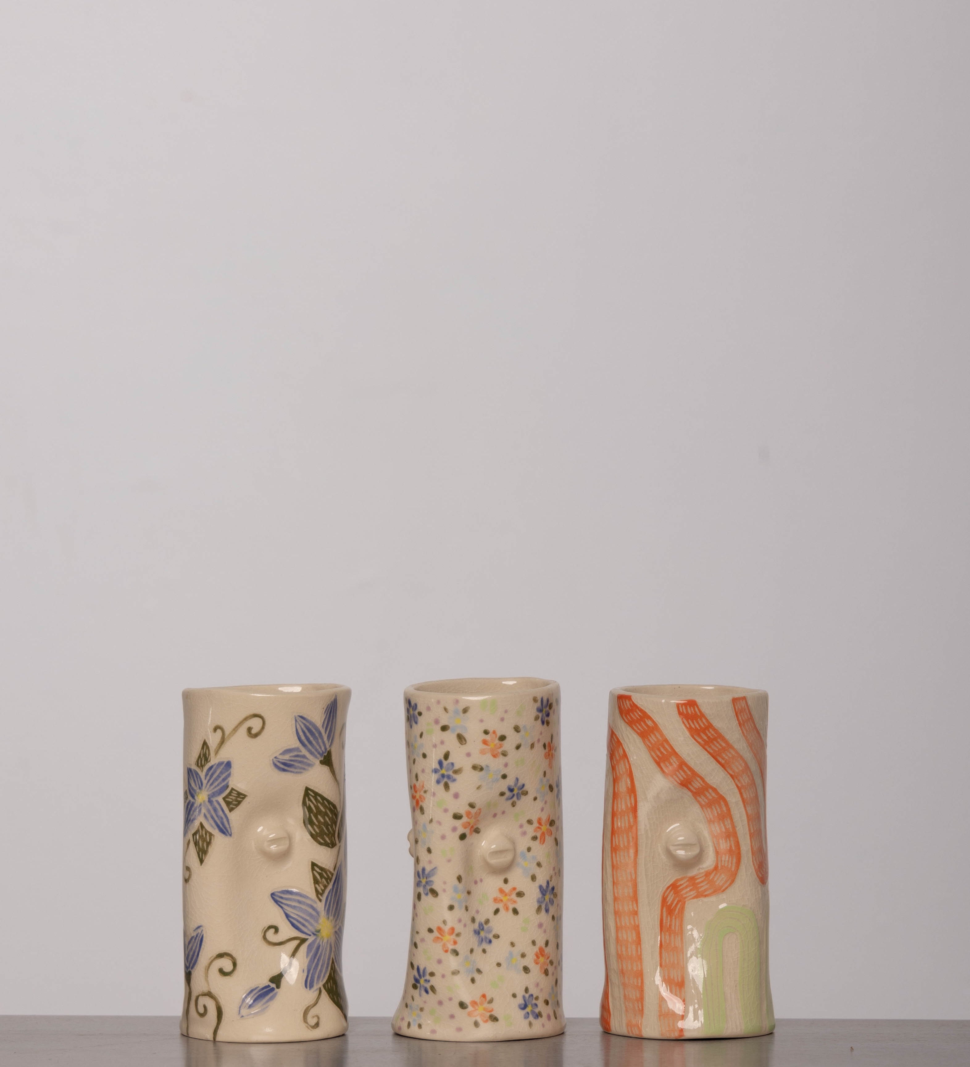 Discover the KKS Small Vase – a handmade 5.5-inch tall, 3.5-inch wide ceramic vase, featuring organic artistry and minimalist elegance.