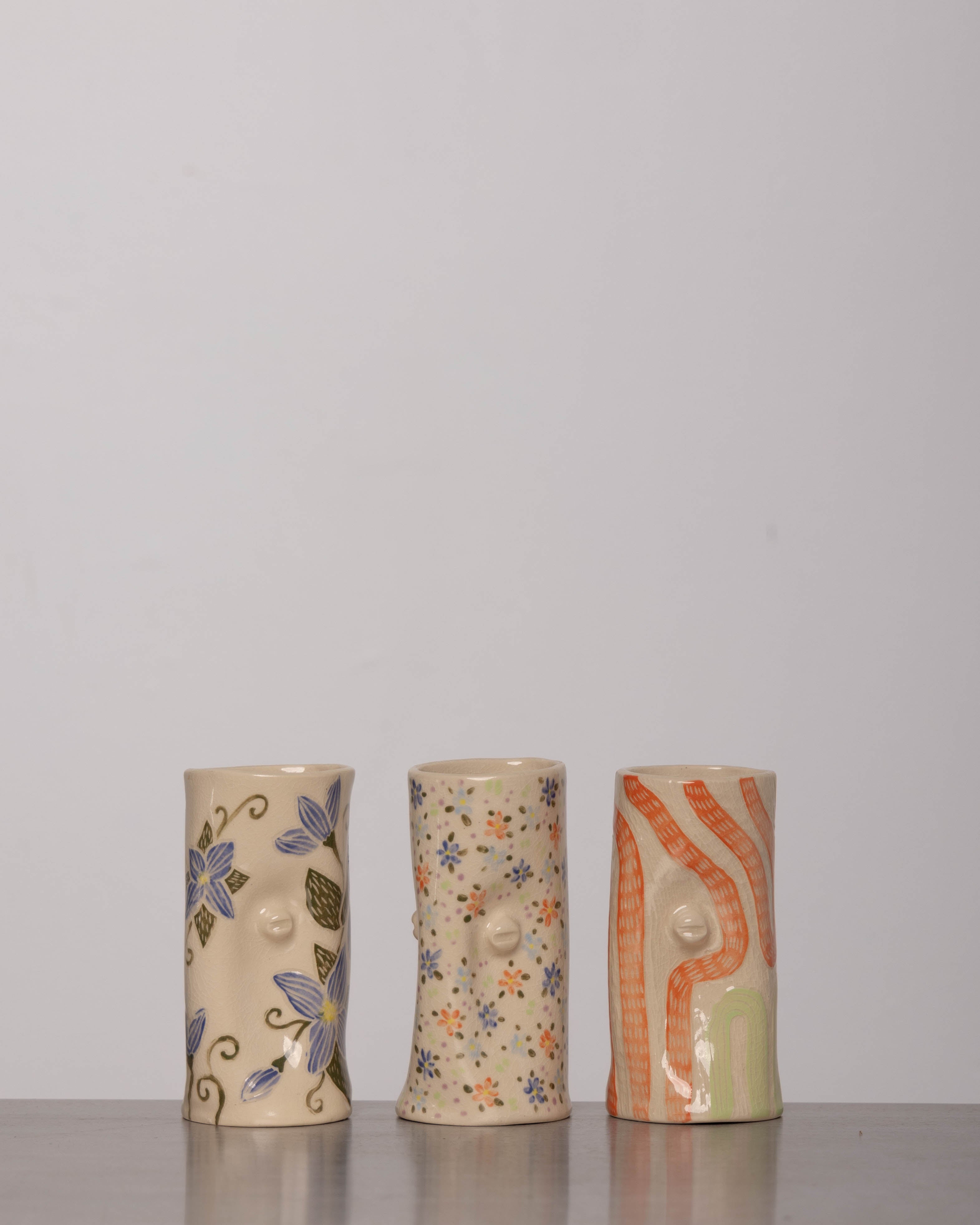 Discover the KKS Small Vase – a handmade 5.5-inch tall, 3.5-inch wide ceramic vase, featuring organic artistry and minimalist elegance.