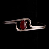 Sterling Silver Wavy Bracelet with Oval Carnelian Stone