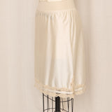 Ivory Nylon Slip Skirt with Tan Lace Trim and Side Slit