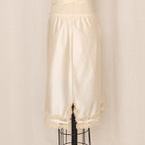 Ivory Nylon Slip Skirt with Tan Lace Trim and Side Slit